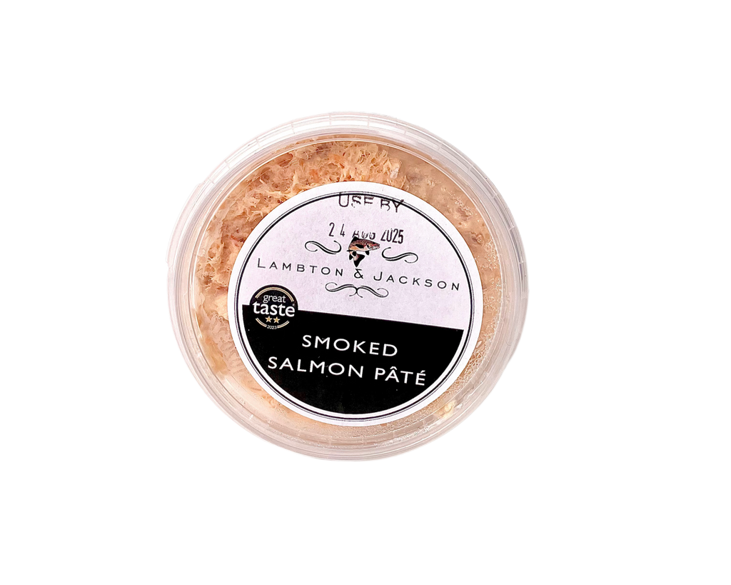 Container of smoked salmon pate with a visible brand label on a white background